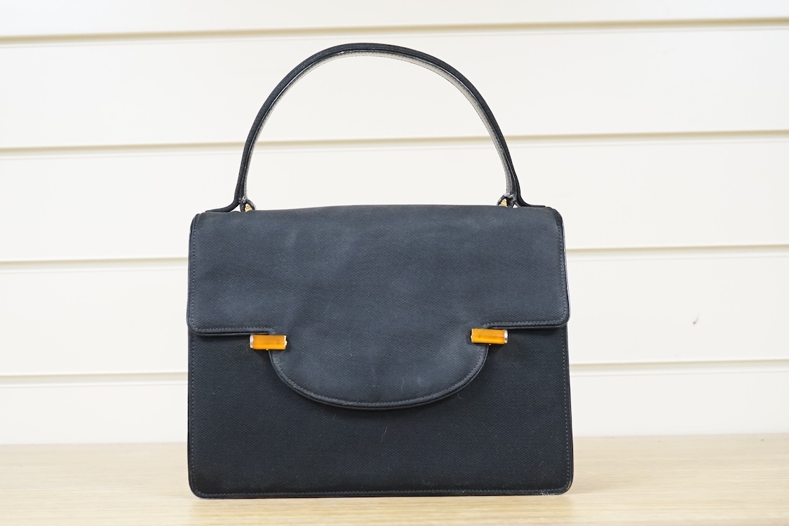 Two 1950's-60's Gucci handbags with one dust bag, largest 26cm wide